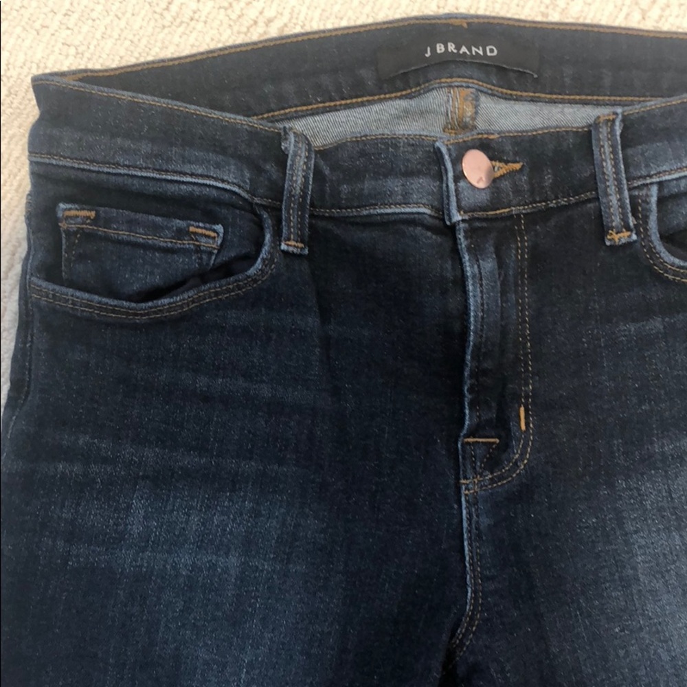 J Brand mid rise in dark denim (oblivion) size 28